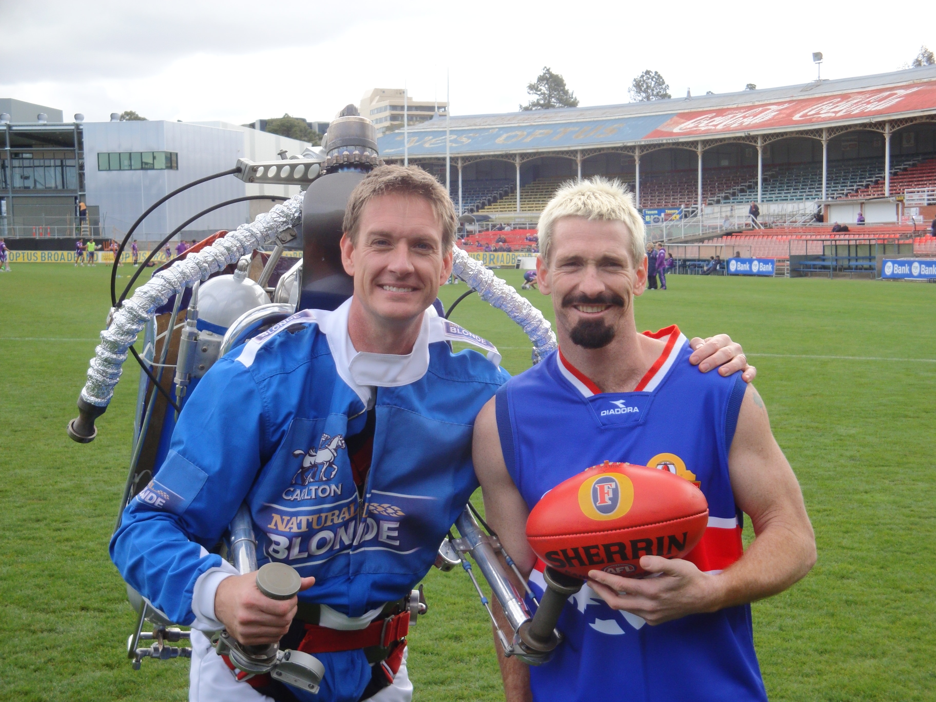 The Rocketman with Australian football champion Aker on the field