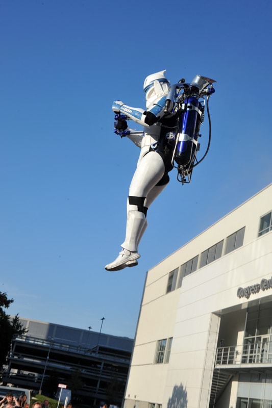 The Rocketman as Captain Rex Clone Trooper flying against a blue sky