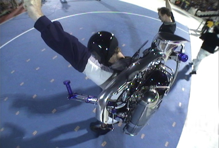 The Rocketman on the rocketbelt at an indoor arena event