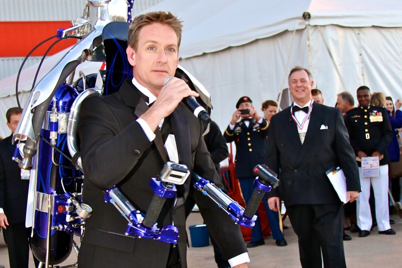 The Rocketman in a tuxedo strapped into the rocketbelt at the Snowball Express event